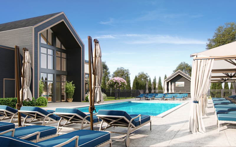 a pool with chairs and umbrellas