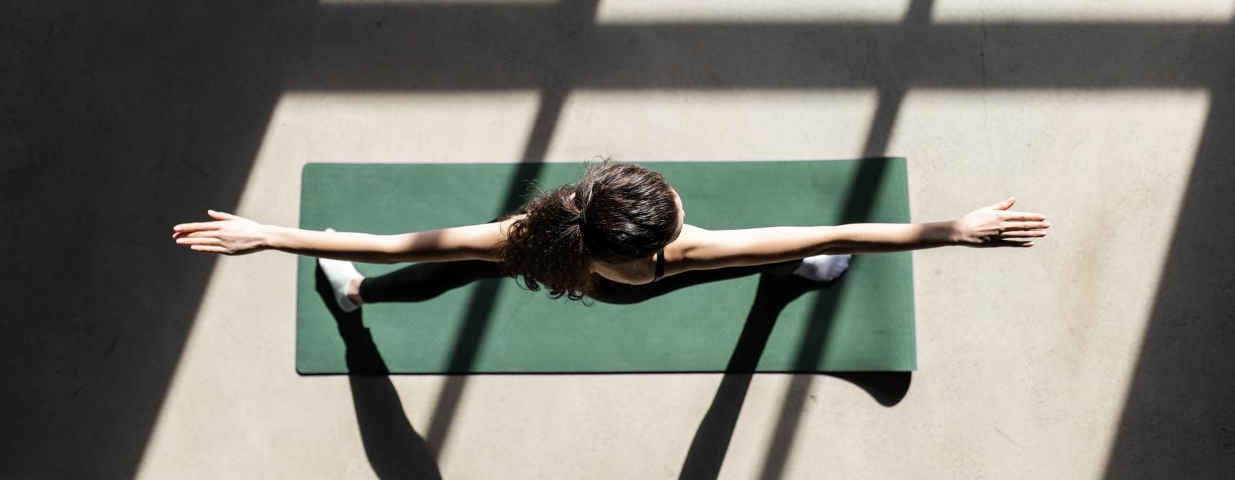 a person standing on a tile floor